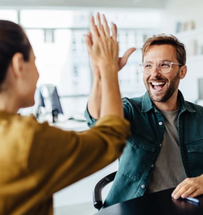 picture of two people high-fiving